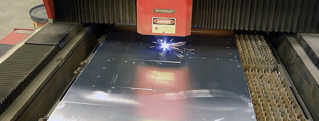 Photo of laser cutting metal at Tooele Army Depot